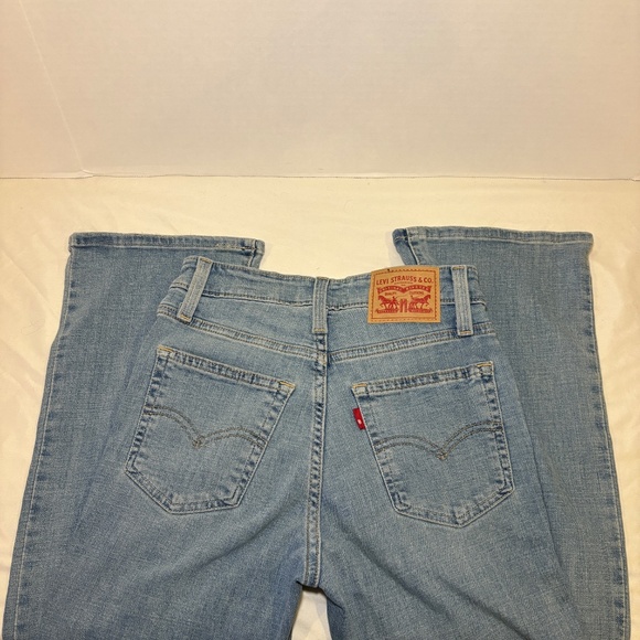 Levi's 725 High Rise Women's Light Blue Distressed Jeans Bootcut Size 25x30 - Picture 1 of 12